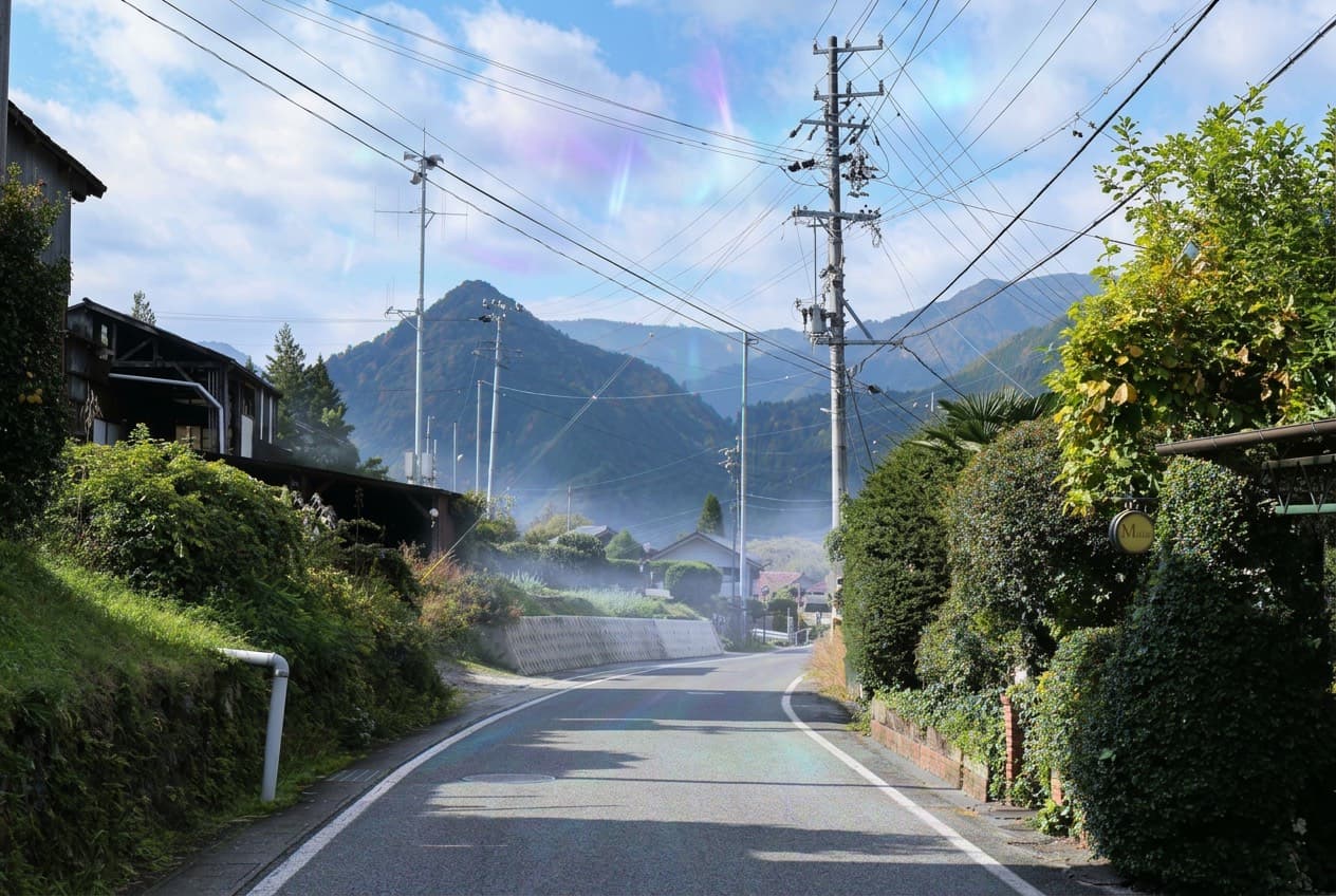 Rural fields in northern Japan under a spectral sky